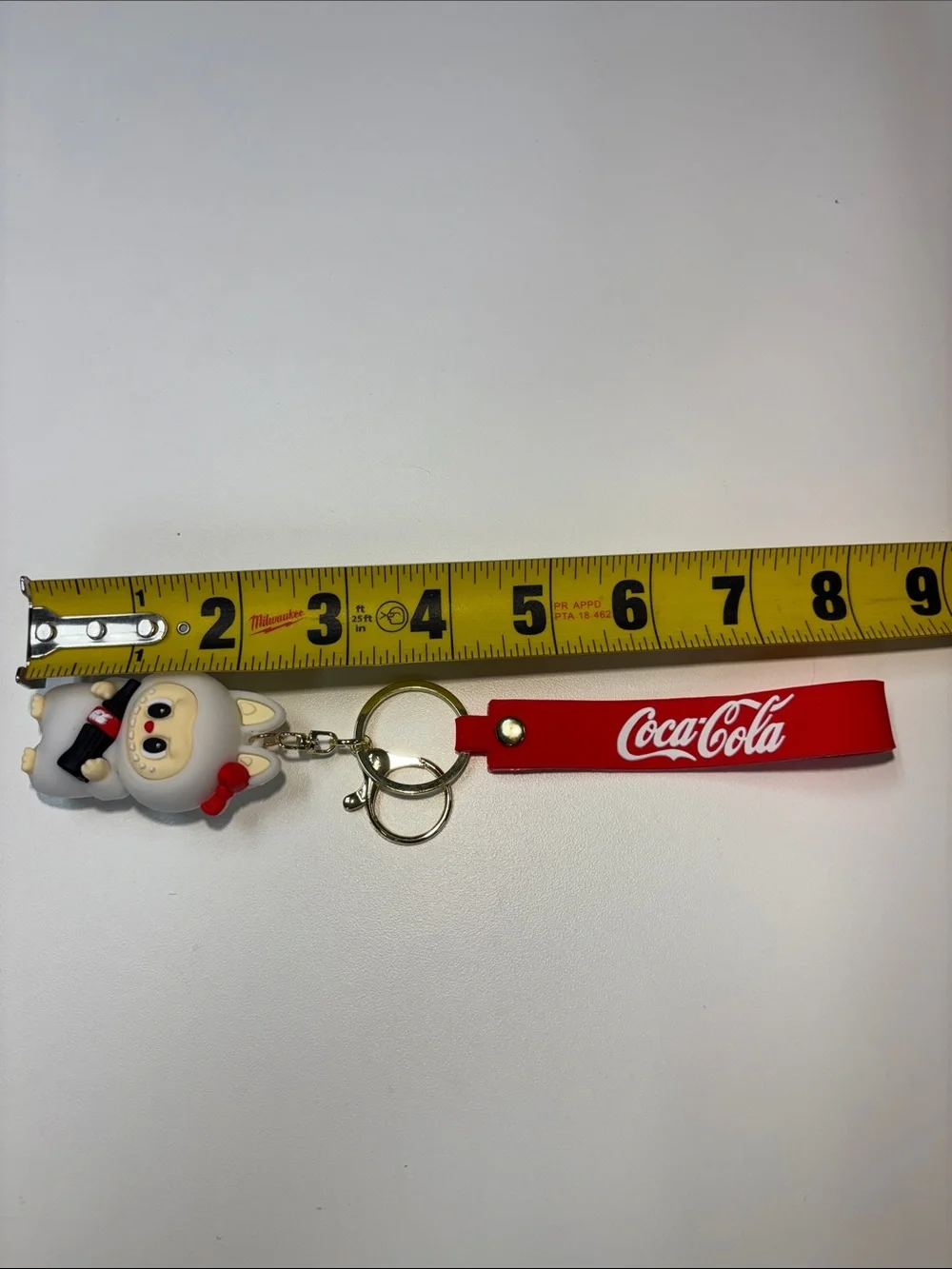 Coca-Cola Red Strap Keychain with White Character Charm NWOT
